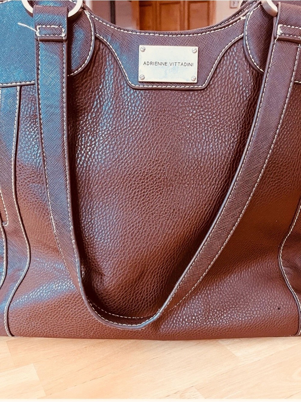 Adrienne Vittadini Brown Leather lap top Tote Bag.